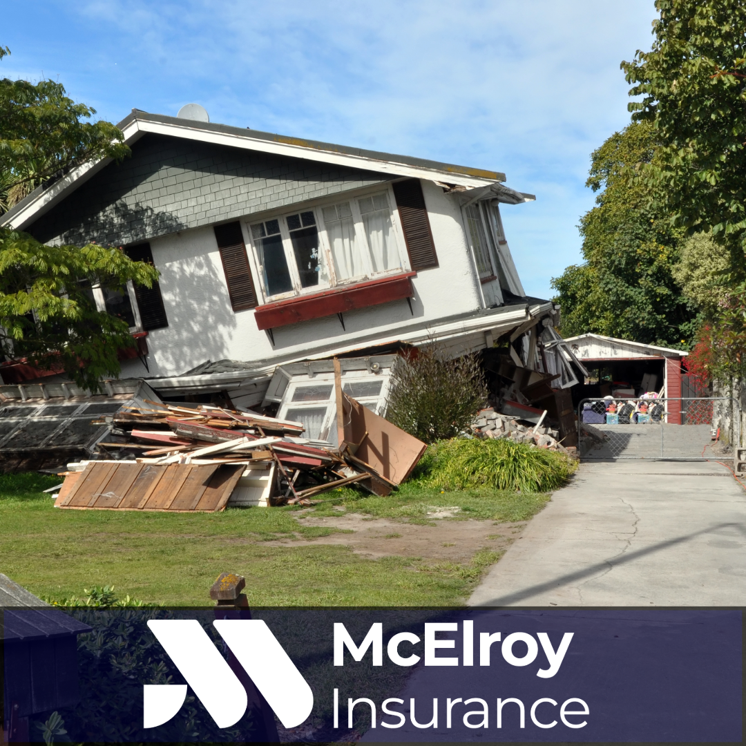 Severely damaged residential home following an earthquake, illustrating the potential financial impact of earthquake damage and the importance of earthquake insurance coverage.